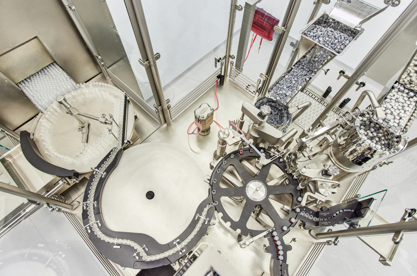 An overhead view of a machine with vials