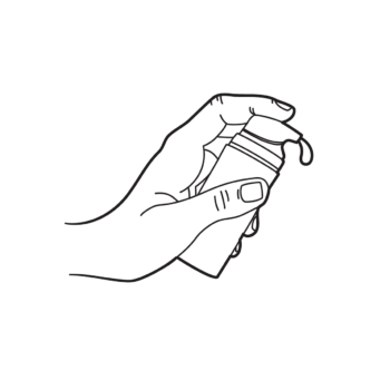 A hand using a small pump