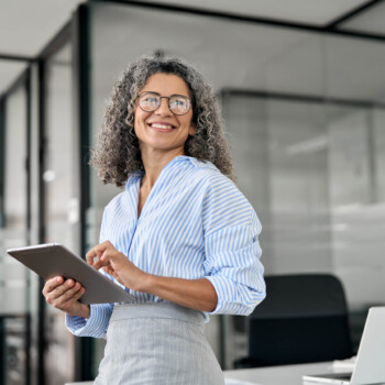 women in office using an iPad